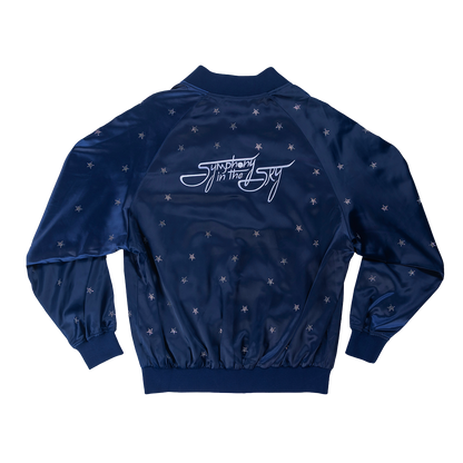 Navy blue jacket with star patterns and 'Symphony in the Sky' logo on a white background